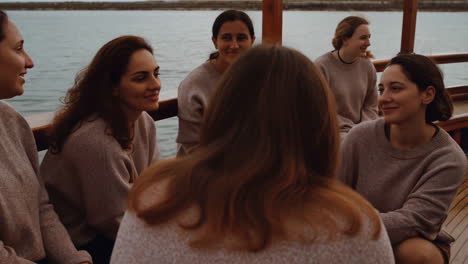 group of women conversing on a boat