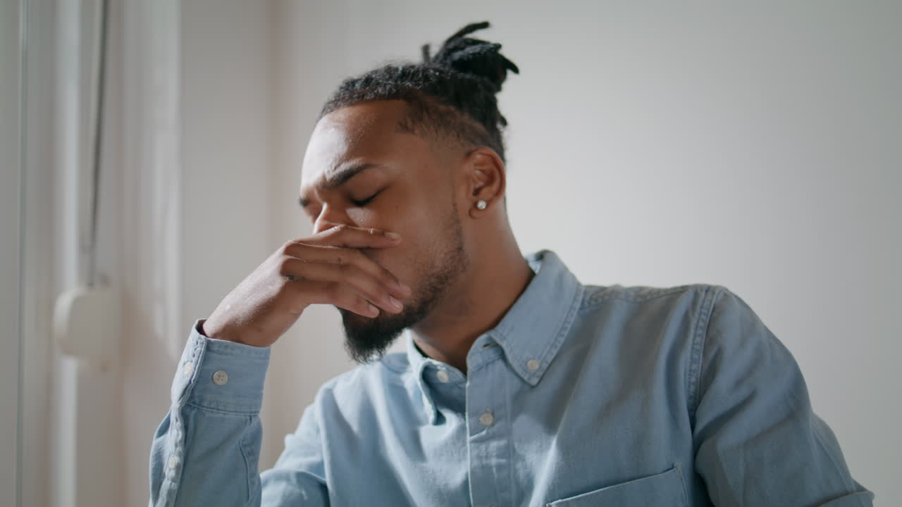 Worried businessman looking cellphone home closeup. Upset guy reading bad news