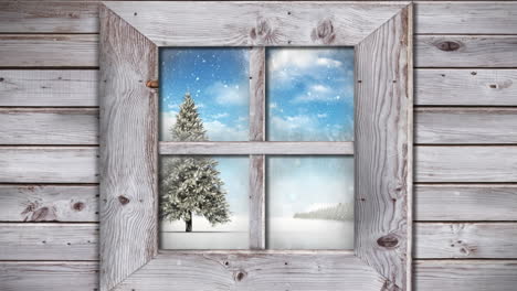 holzfensterrahmen gegen schnee, der über den weihnachtsbaum in der winterlandschaft fällt