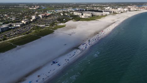waves crashing onto the beautiful winter playground of siesta key beach on siesta key island, florida