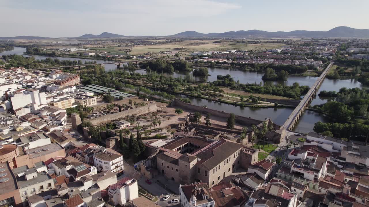 Aerial: Roman Bridge of M&eacute;rida and Guadiana River in Spanish cityscape