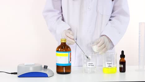 scientist performing iodine clock reaction experiment in laboratory setting