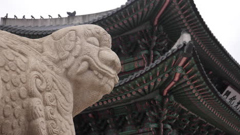 stone lion statue at a korean temple