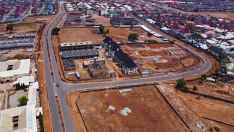 jib down of a beautiful new block being built in a suburban neighborhood in abuja, nigeria