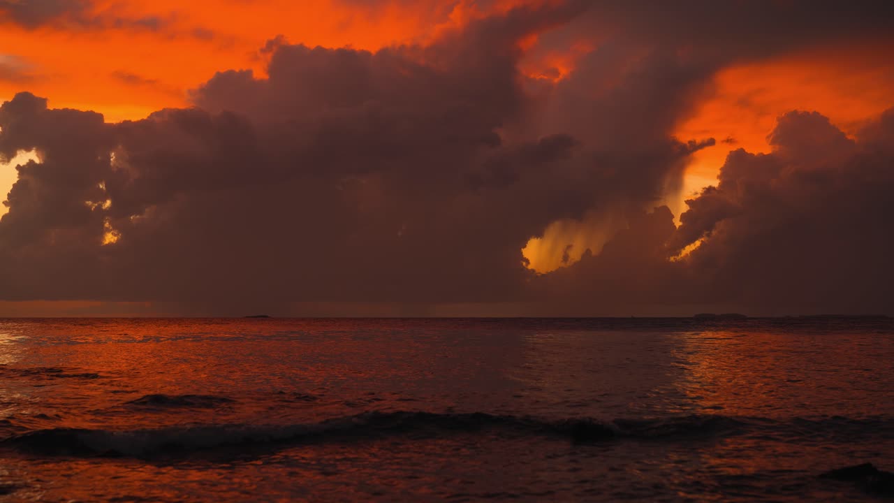 Beautiful sunset sky with moving clouds and dark sea water reflections in Istria, Croatia
