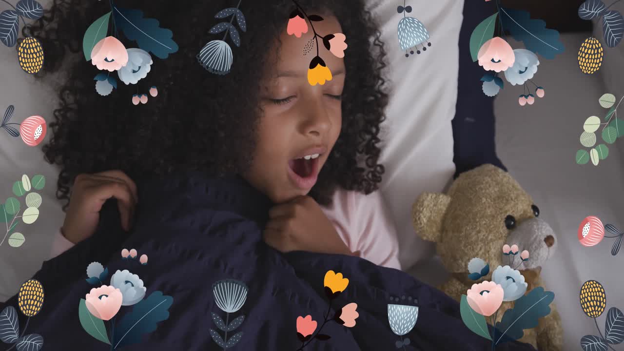 Animation of flowers over african american girl yawning in bed