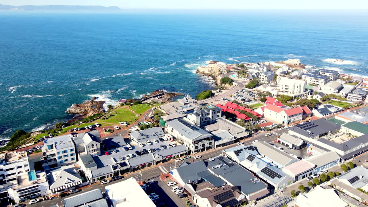 Drone view of Hermanus CBD buildings toward waterfront Old Harbour and Gearings
