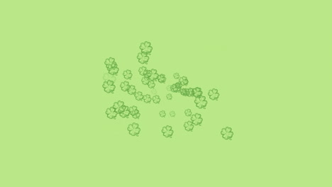 digital animation of multiple clover leaves forming against green background