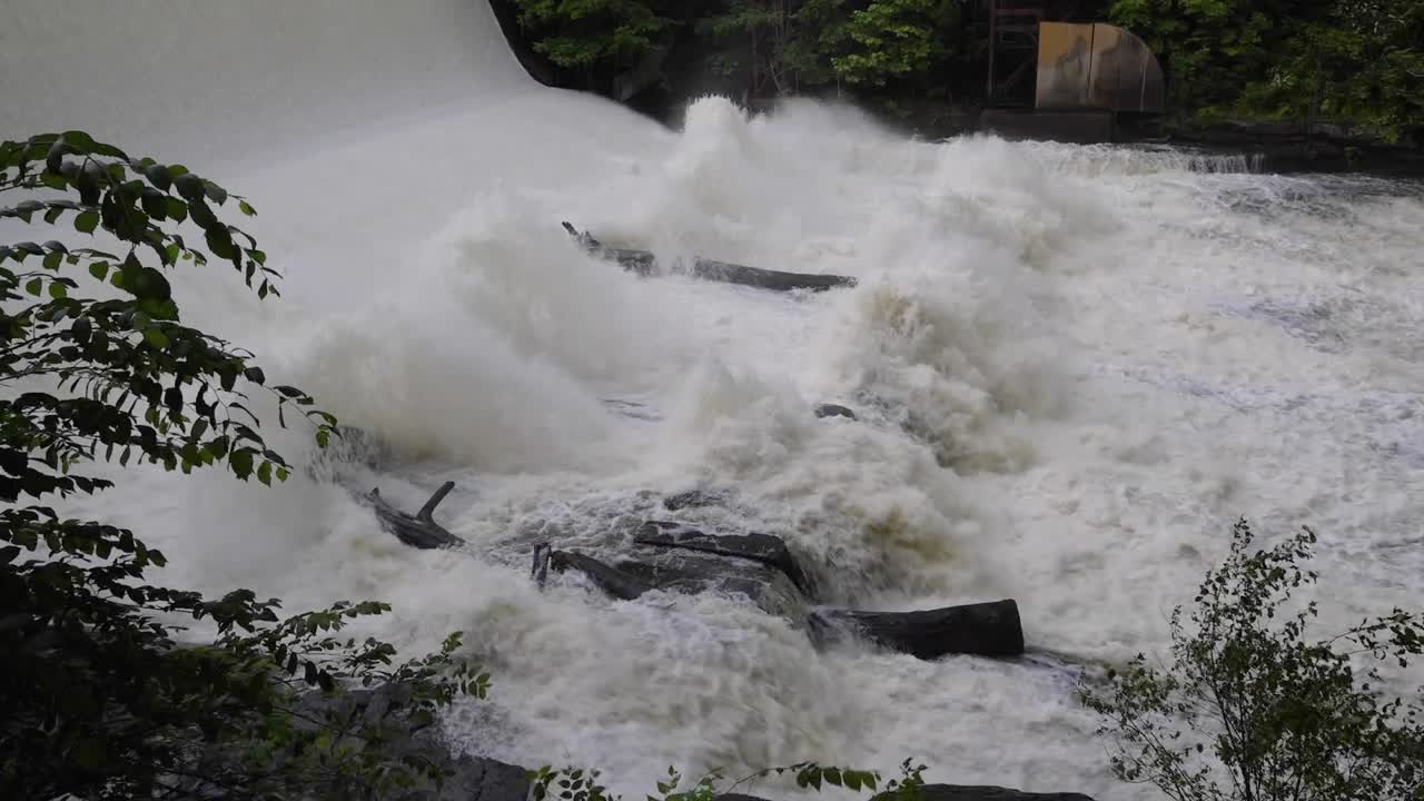 Scenic shots of the Cuyahoga River at Gorge Dam in Summit County, Ohio, where a man-made waterfall and reservoir meet a revitalized natural landscape near Akron and Cuyahoga Falls.