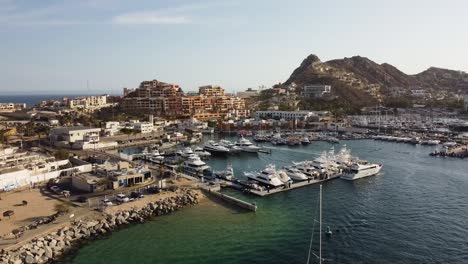 Aerial-View-of-the-Cabo-San-Lucas-Marina-in-Baja-California-Sur,-Mexico,-drone-orbit-left