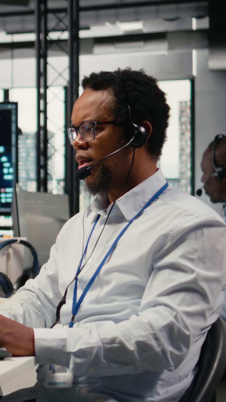 Vertical video Engineering team in office providing remote diagnostics