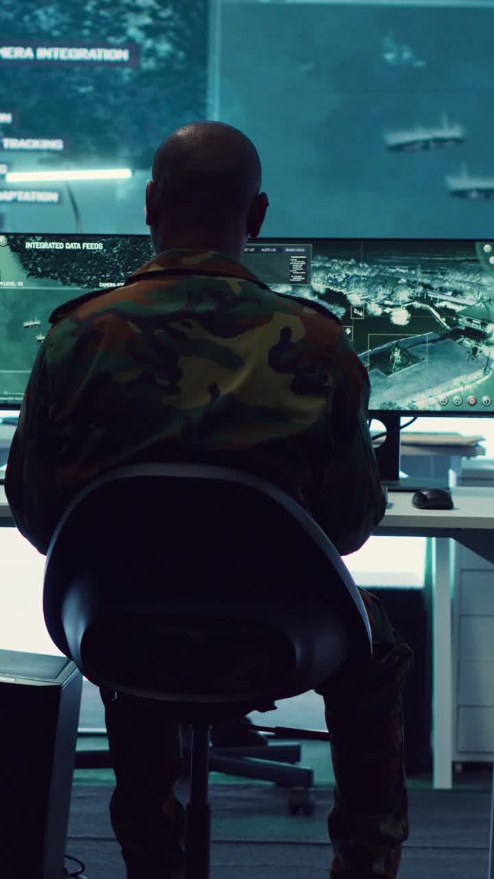 Military Man in Camouflage Uniform Working on Computer in Control Room