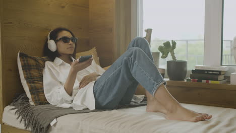 young blind woman liying on the bed