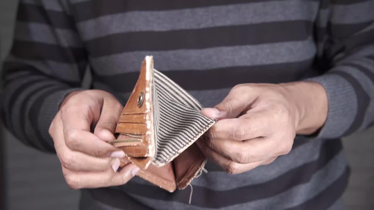 Empty Wallet in Hands