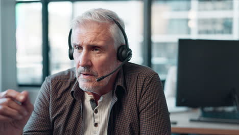 man with headset in office
