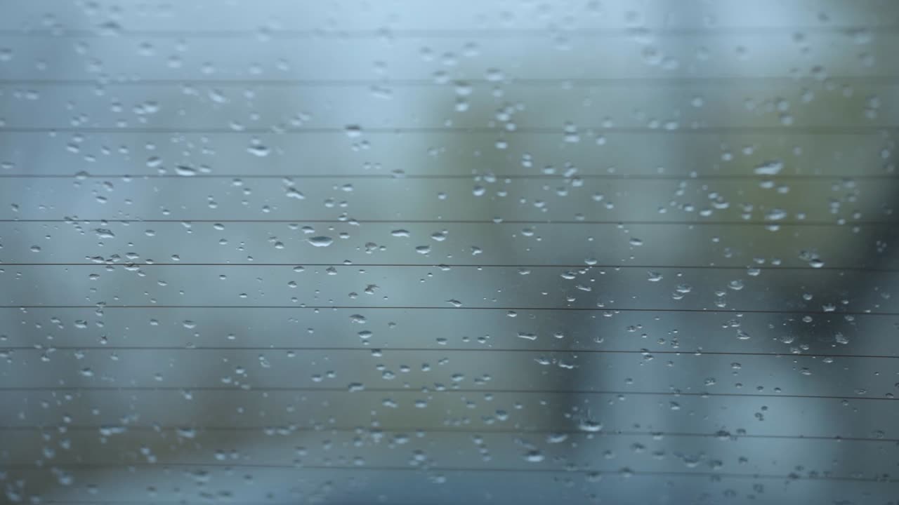 Car Window Covered With Raindrops - Closeup Shot