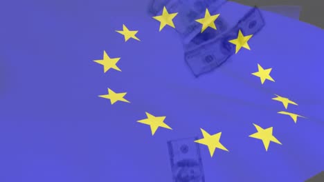 animation of flag of european union over american dollar banknotes