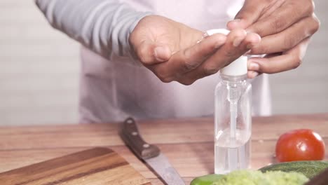 hand washing and sanitizing in a kitchen setting