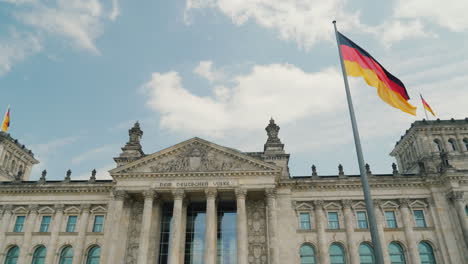 bundestag in berlin with german flags