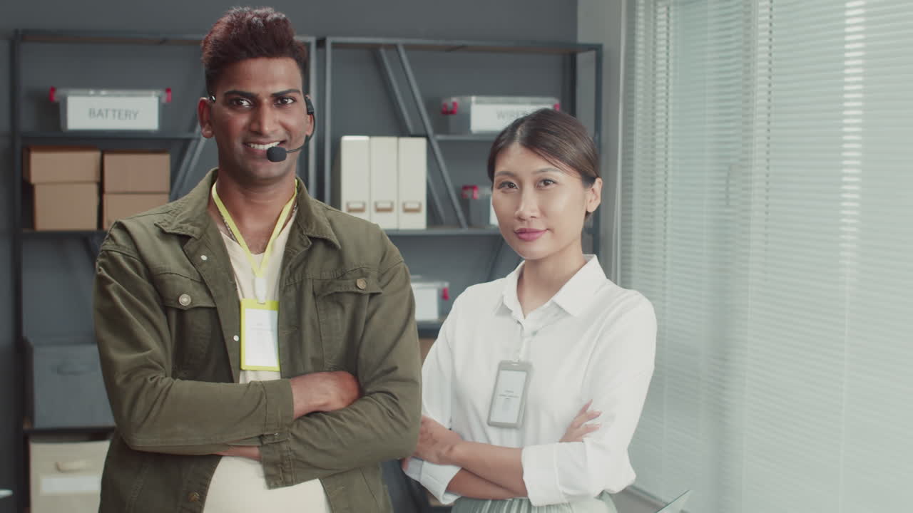Repair Center Workers Looking at Camera