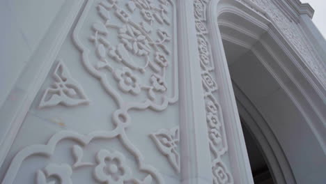 ornate white marble arch detail