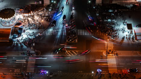 nighttime aerial view of a busy city intersection