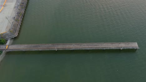 Birdseye-view-of-small-boat-docked-at-port