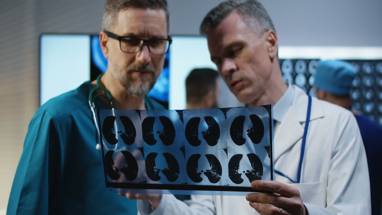 Doctors Reviewing Chest X-Ray