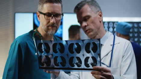 doctors reviewing chest x-ray