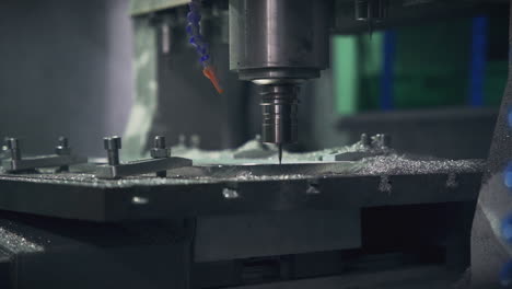 molding machine shaping a mold slow motion medium shot