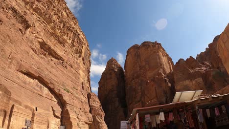 watching the clouds pass above the tourists and ancient tombs of petra, jordan - time lapse