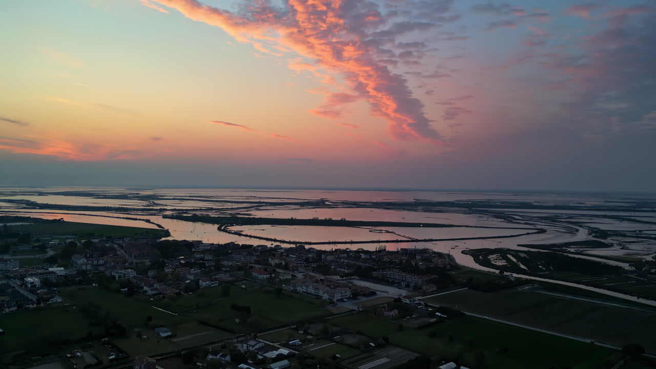 Aerial drone view of the Venetian Lagoon at sunset, near Cavallino-Treporti in northern Italy
