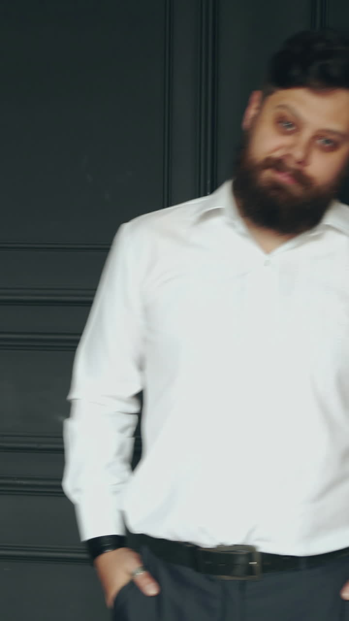 Young bearded man. Brutal caucasian serious handsome man in studio