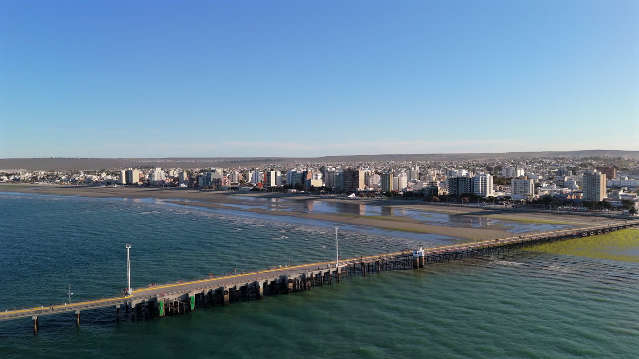 Aerial view of the pier and tourist city of Puerto Madryn. Chubut, Argentina. Drone. 4k.