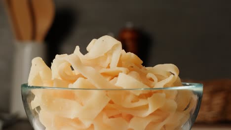 dried fish snacks in a glass bowl