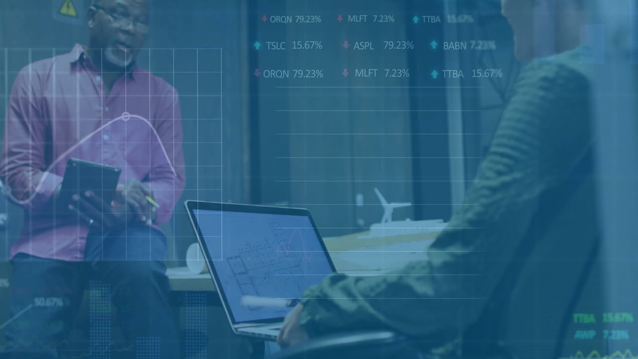 Viewing stock data overlay on laptop, business meeting in office setting