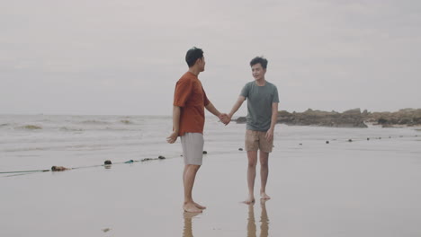 cheerful couple on the beach