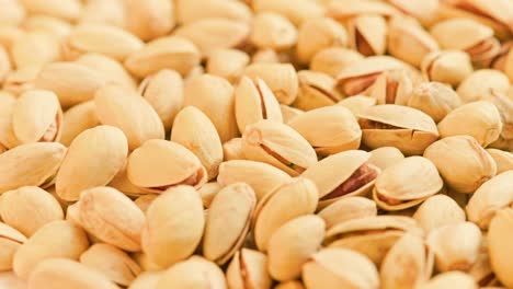 looped rotating pistachios full frame close-up background