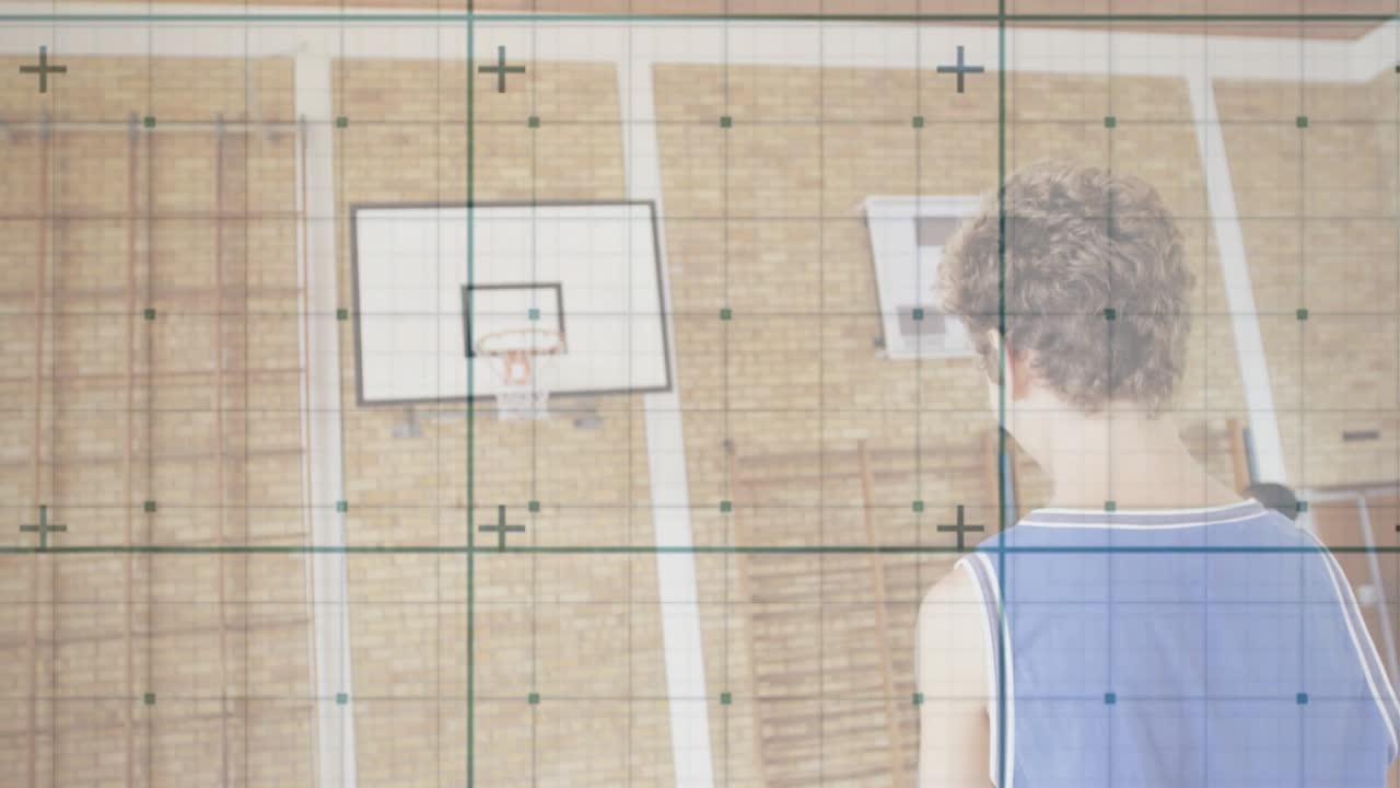 Training grid appearing, boy shifting and shooting ball toward hoop in gym, overlay guiding shot