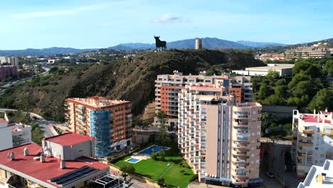 Luxury-buildings-and-bull-on-top-of-hill-in-fuengirola-spain