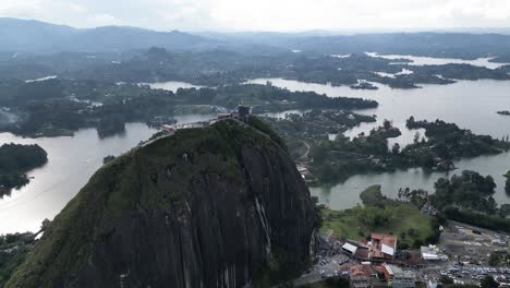 Aerial-view-from-a-drone-of-La-Piedra-del-Penol-and-the-Guatape-reservoir-near-Medellin,-Antioquia,-Colombia