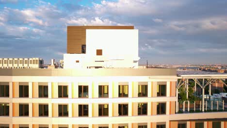 aerial view close to the roof and balcony of tall building in sunny bronx, ny