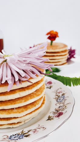 stack of pancakes with flowers