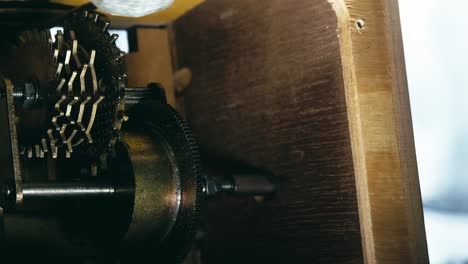 metronome internal brass cog wheel, pendulum gear mechanism action macro