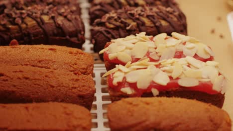 artezan bread with red strawberry jam on top, fresh bake double chocolate banana artesian bread in bakery shop close-up. artisan bread is making by skill bakers using natural and high-quality ingredients. food with health and flavour benefits. sweet breads for dessert and breakfast