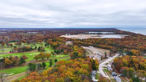 a golf course nestled along the coast of lake michigan