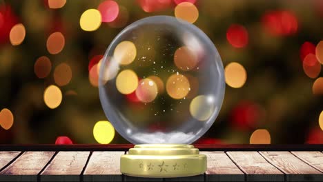 Animation-of-christmas-snow-globe-with-snow-falling-and-fairy-lights-on-black-background