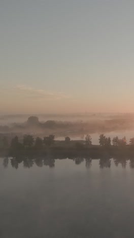 misty sunrise over a river