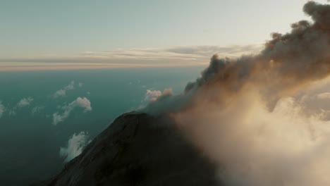 volcanic eruption of fuego volcano during sunset in guatemala