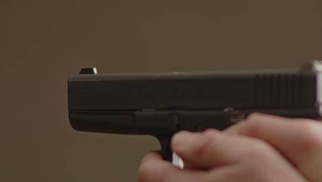 A-Glock-17-handgun-being-fired-with-low-recoil